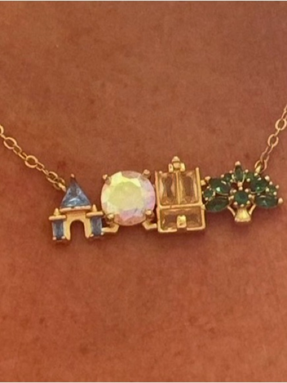 Beautiful! necklace symbolizing four Disney World park icons